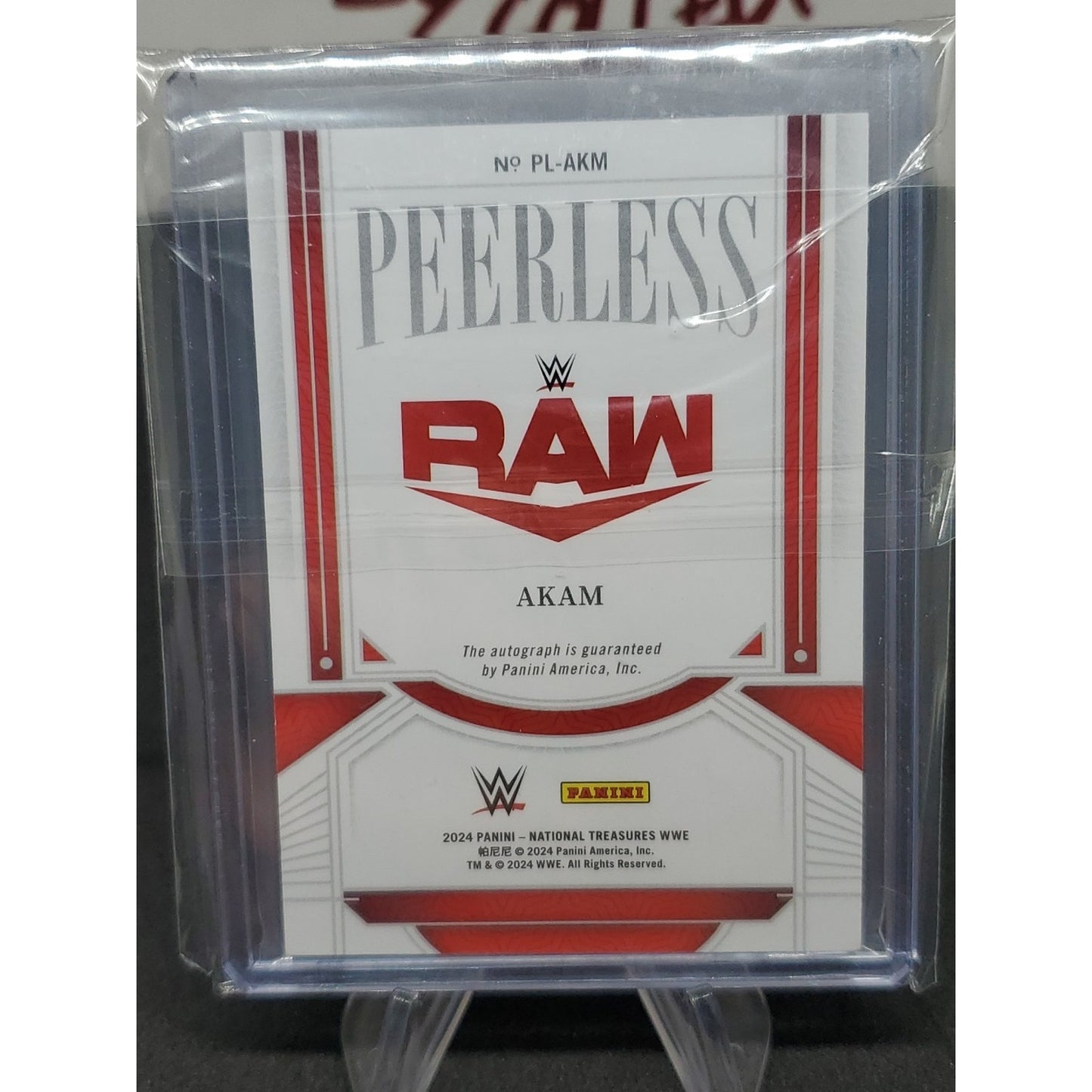 2024 Panini National Treasures WWE - Peerless Signatures Akam #PL-AKM /99 (AU)