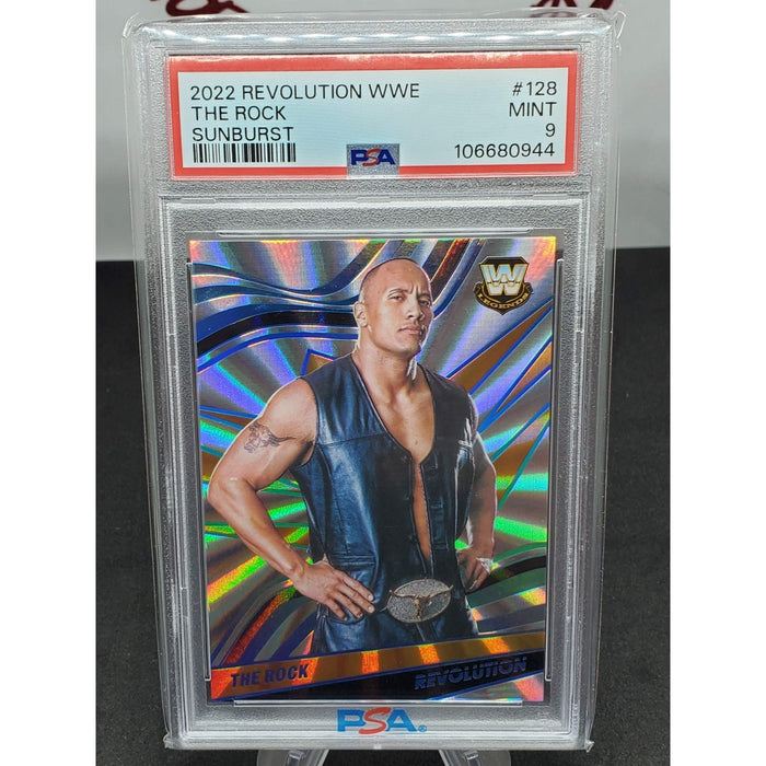 2022 Panini Revolution WWE The Rock Card WWE Sunburst #128 Low Pop PSA 9 #/99