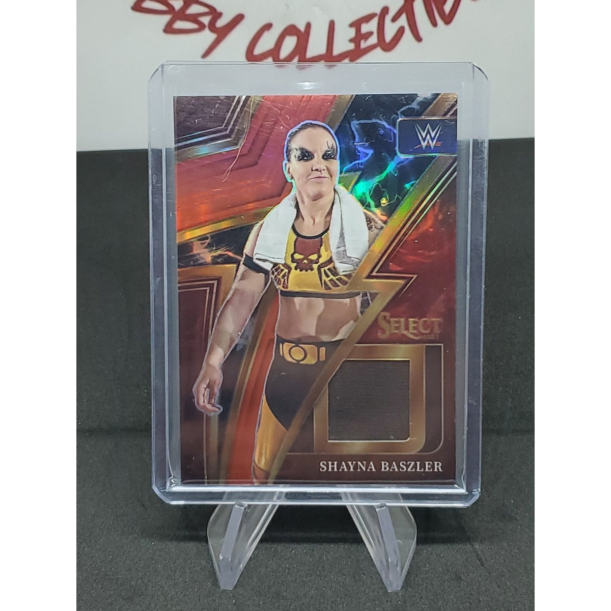 2023 Panini Select WWE Shayna Baszler Sparks Red 54/99