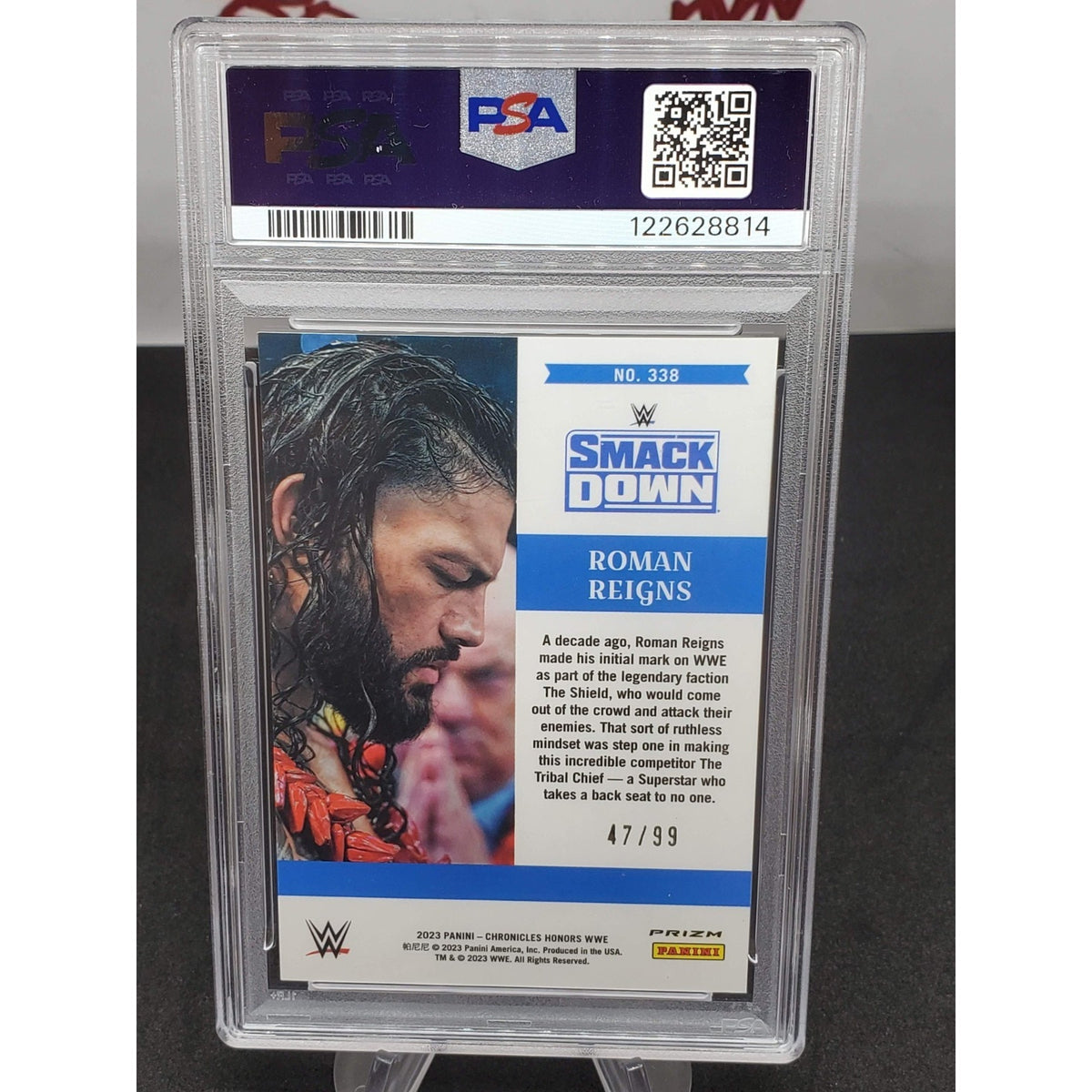 2023 PANINI CHRONICLES WWE Blue #338 ROMAN REIGNS /99 PSA 10