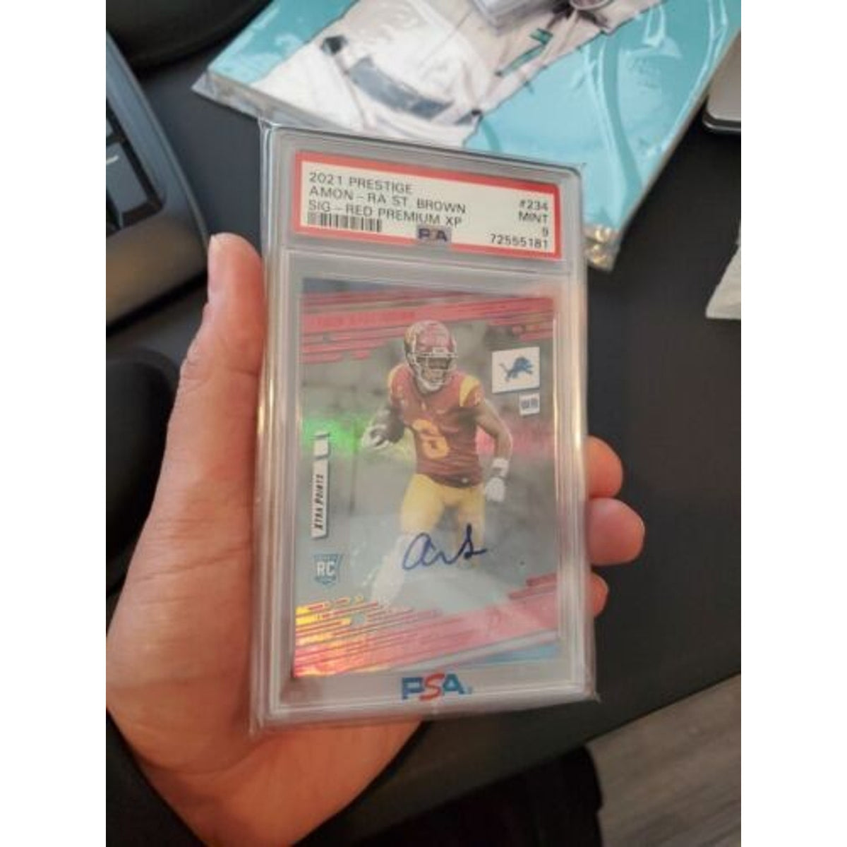 Amon-Ra St. Brown 2021 Prestige Red Xtra Points Rookie Auto #234 Lions RC PSA 9