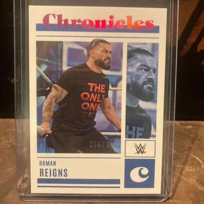 2023 Panini Chronicles WWE - Roman Reigns #44 - Pink /349 SP - Pack Fresh New