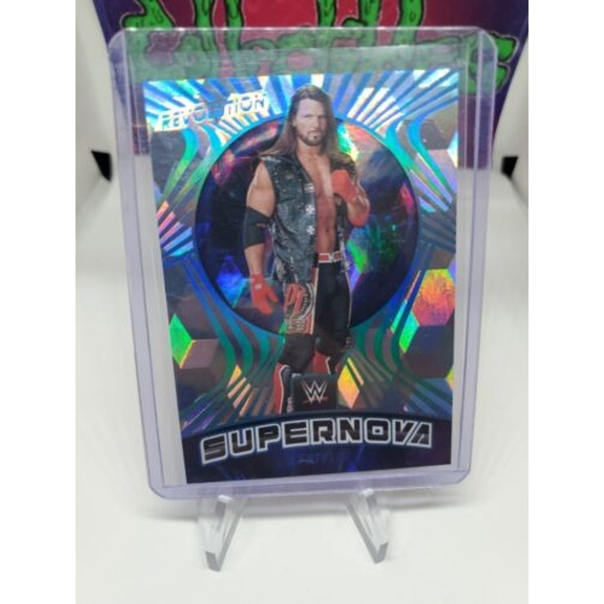 AJ STYLES 2022 PANINI WWE REVOLUTION SUPERNOVA CUBIC #'d /49 Debut Edition