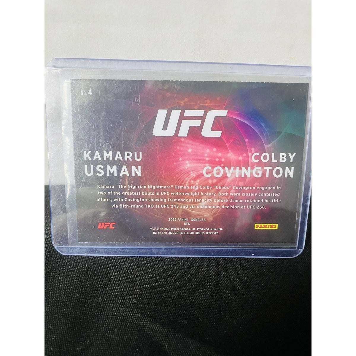 2022 Panini Donruss UFC Duos #4 Kamaru Usman Colby Covington Orange Laser Holo