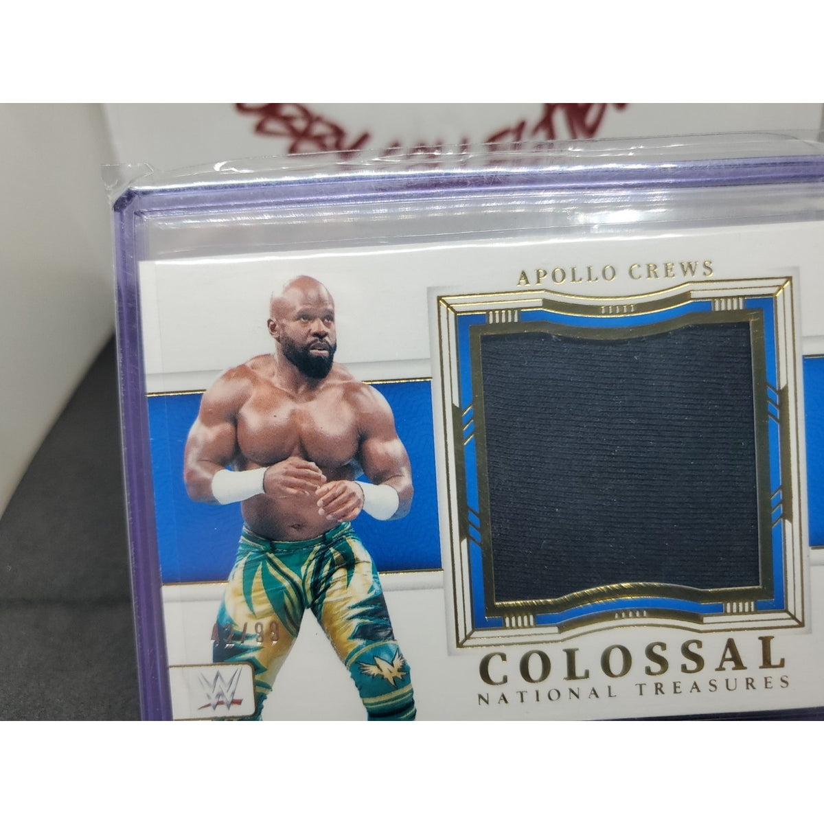 2024 Panini National Treasures WWE - Colossal Materials Apollo Crews #CL-ACR /99