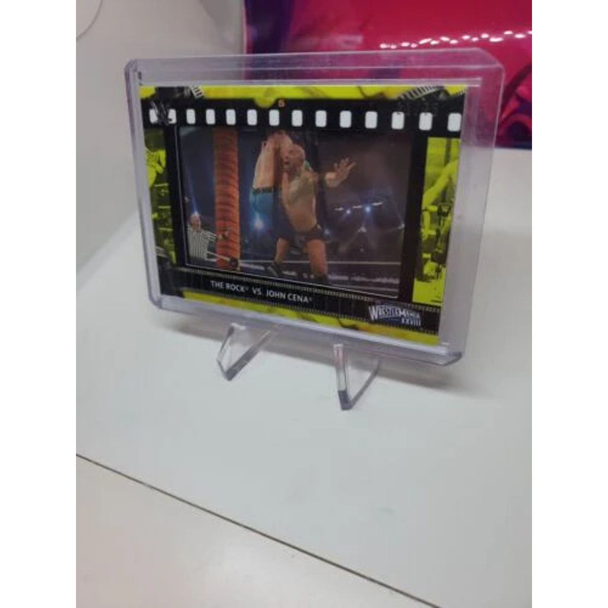 2021 Topps WWE The Rock vs John Cena Film Strip Relic Yellow 21/75 mint