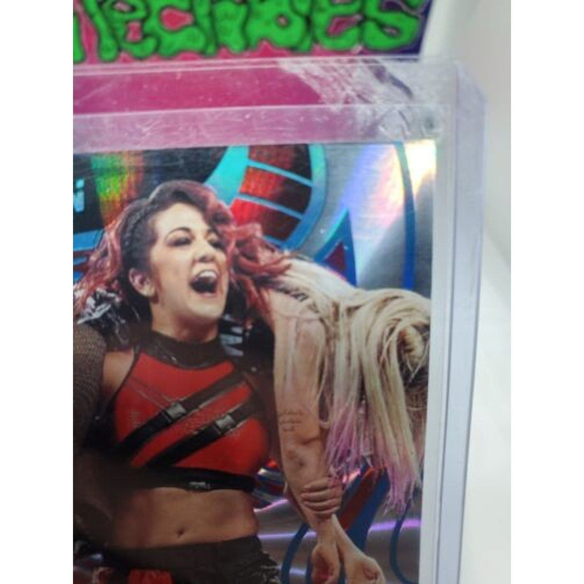 2023 Panini Revolution WWE Sunburst Bayley /99 Fresh Pull