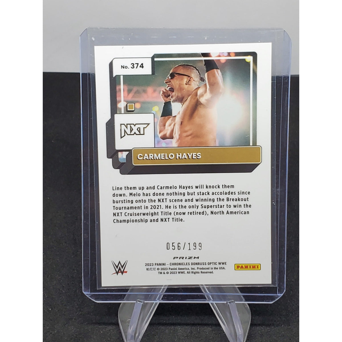 Carmelo Hayes 2023 Panini Chronicles WWE Optic Pink Prizm /199 #374