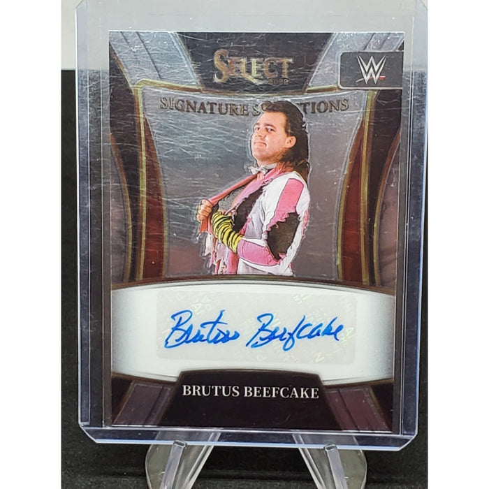 2022 Panini Select WWE - #SN-BBF Brutus "The Barber" Beefcake Auto