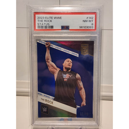 THE ROCK 2023 DONRUSS ELITE WWE SP BLUE STATUS #74/80 PSA 8