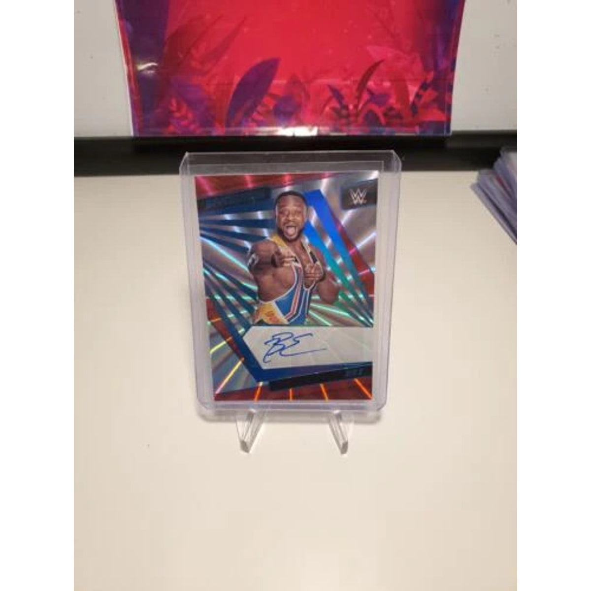 BIG E - 2022 PANINI REVOLUTION WWE SUNBURST AUTO #81/99 NEWDAY
