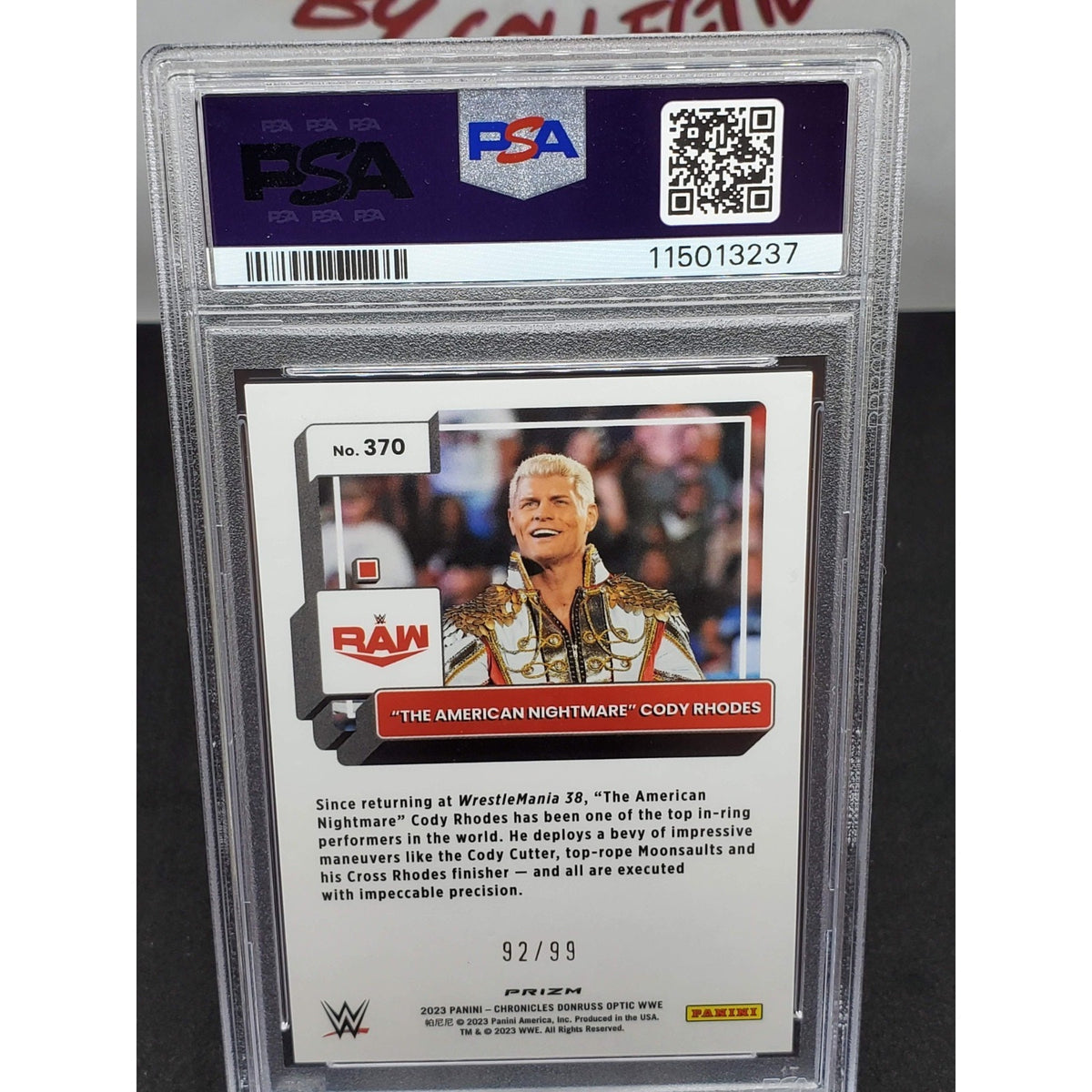 2023 Panini Chronicles Donruss Optic WWE Cody Rhodes Blue Prizm /99 #370 PSA 7