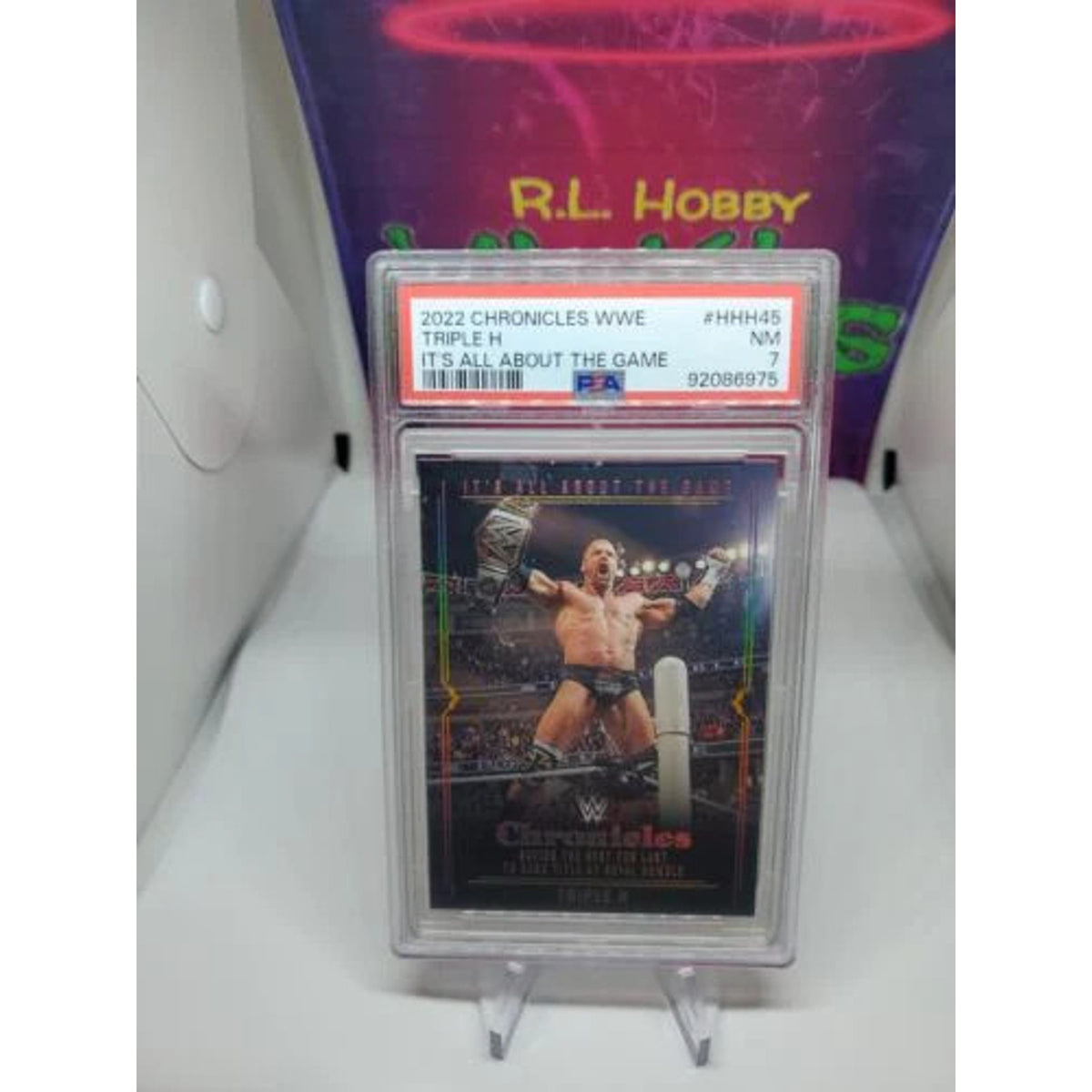 2022 Panini Chronicles WWE It's All About The Game Triple H #HHH-45 PSA 7 P