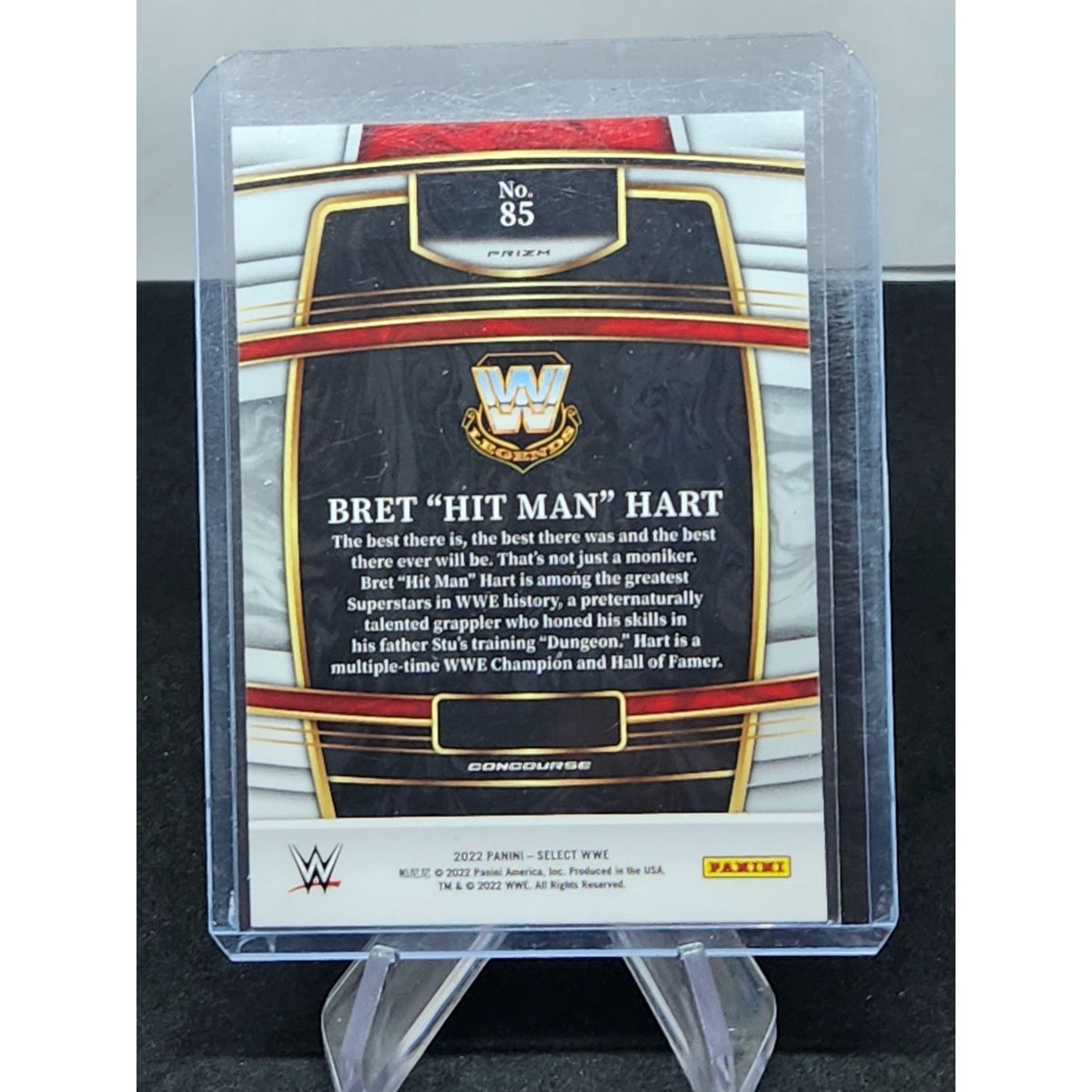 2022 Panini Select WWE #85 Bret “Hit Man” Hart Orange Flash Prizm