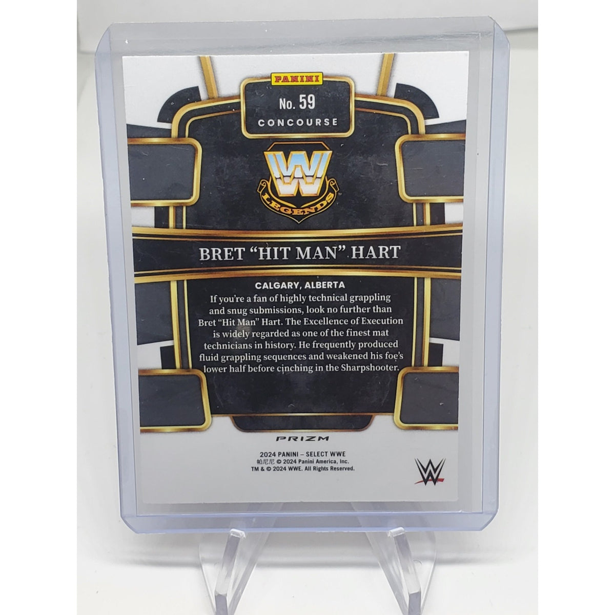 2024 Panini Select WWE - Concourse Bret Hart #59 Orange Flash Prizm