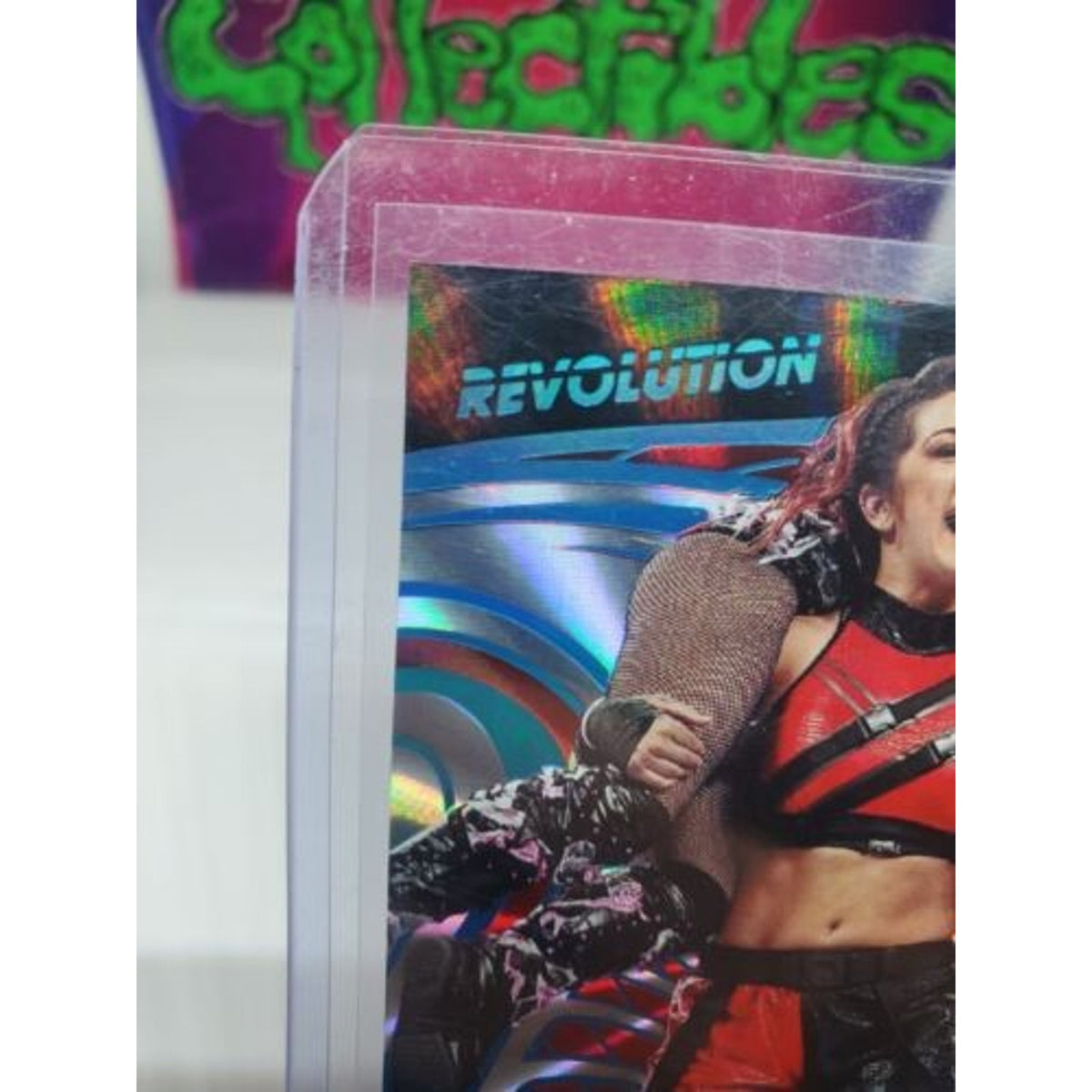 2023 Panini Revolution WWE Sunburst Bayley /99 Fresh Pull