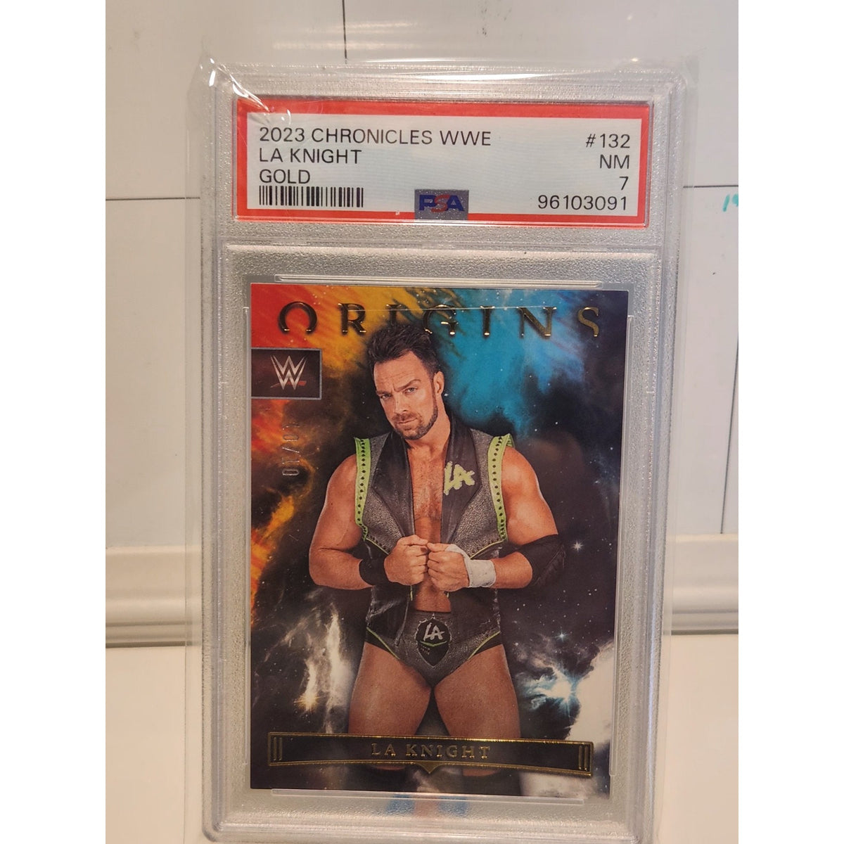 2023 Chronicles WWE LA Knight Origins Gold /10 PSA 7 #132