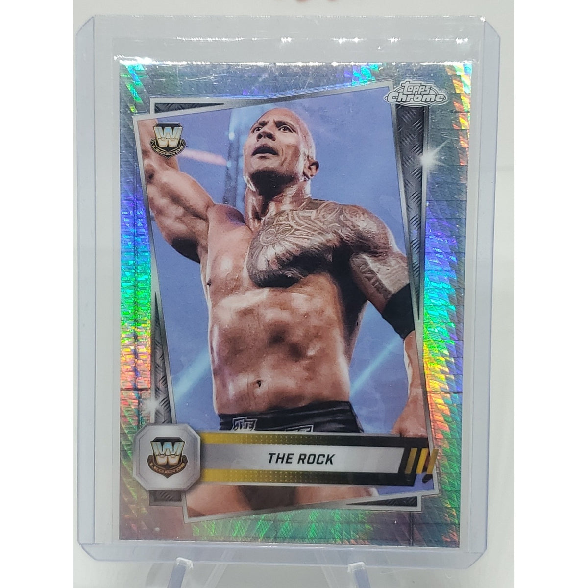 2025 Topps Chrome WWE Prism Refractor #10 The Rock – Legend