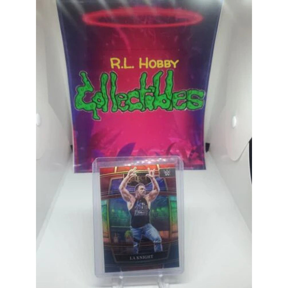 LA Knight 2022 Panini Select WWE #1 Red & Blue Prizm NXT 2.0 RAW SmackDown