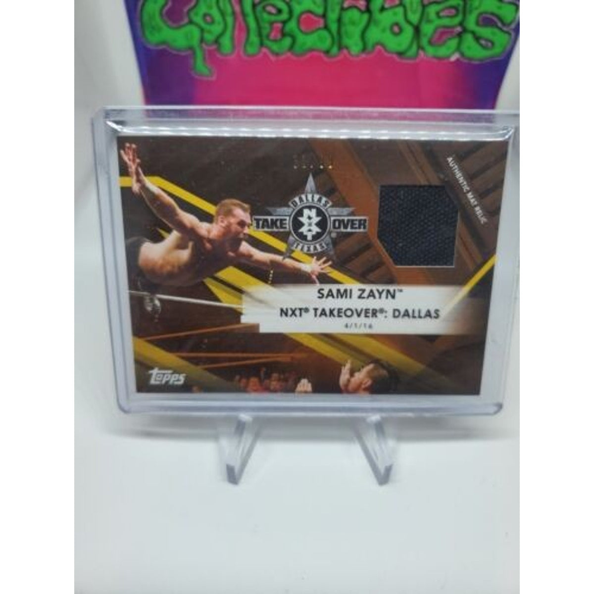 Topps WWE Road to WM Bronze Sami Zayn NXT Takeover Dallas Mat Relic Card #33/99