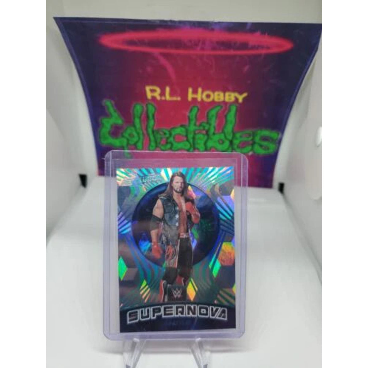 AJ STYLES 2022 PANINI WWE REVOLUTION SUPERNOVA CUBIC #'d /49 Debut Edition