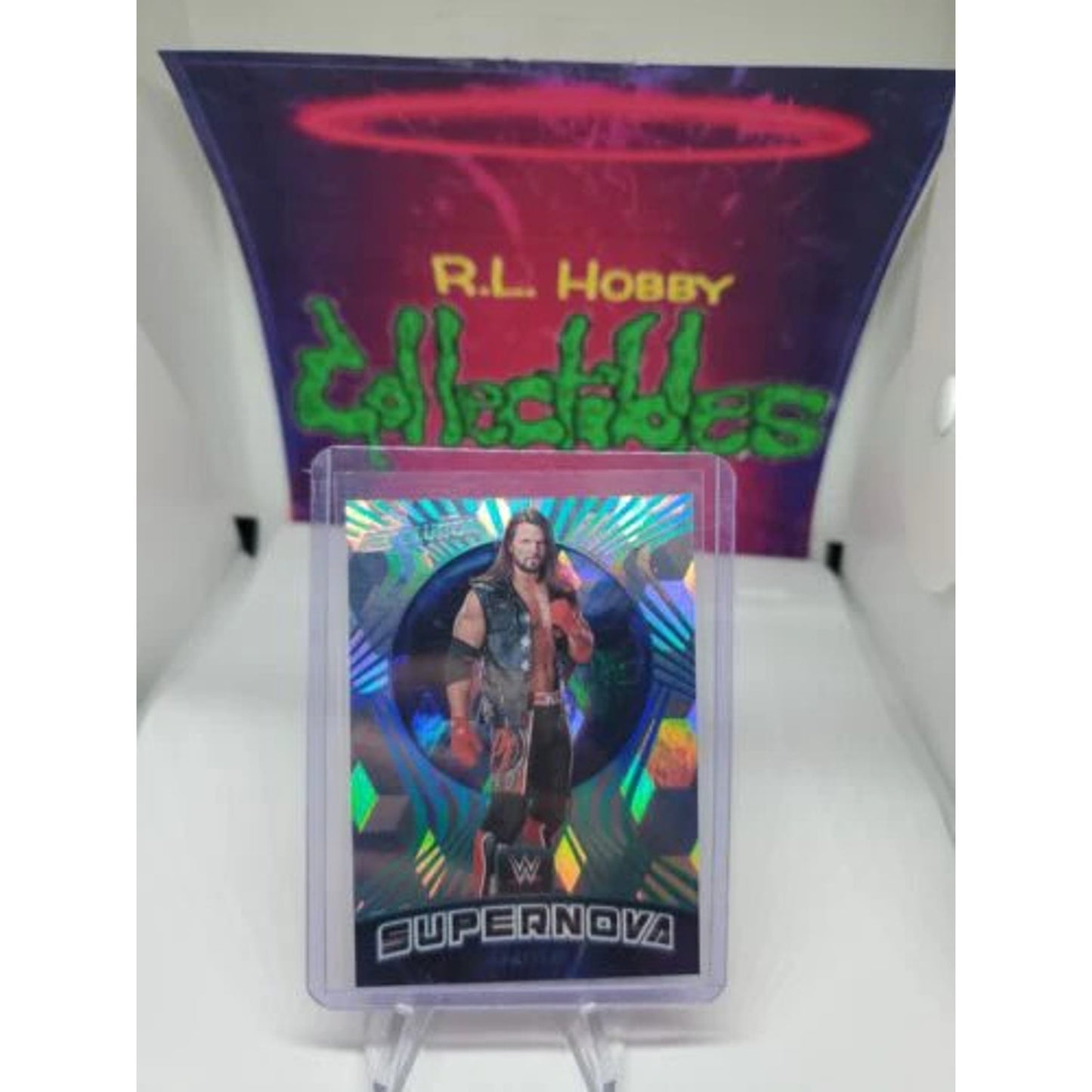 AJ STYLES 2022 PANINI WWE REVOLUTION SUPERNOVA CUBIC #'d /49 Debut Edition