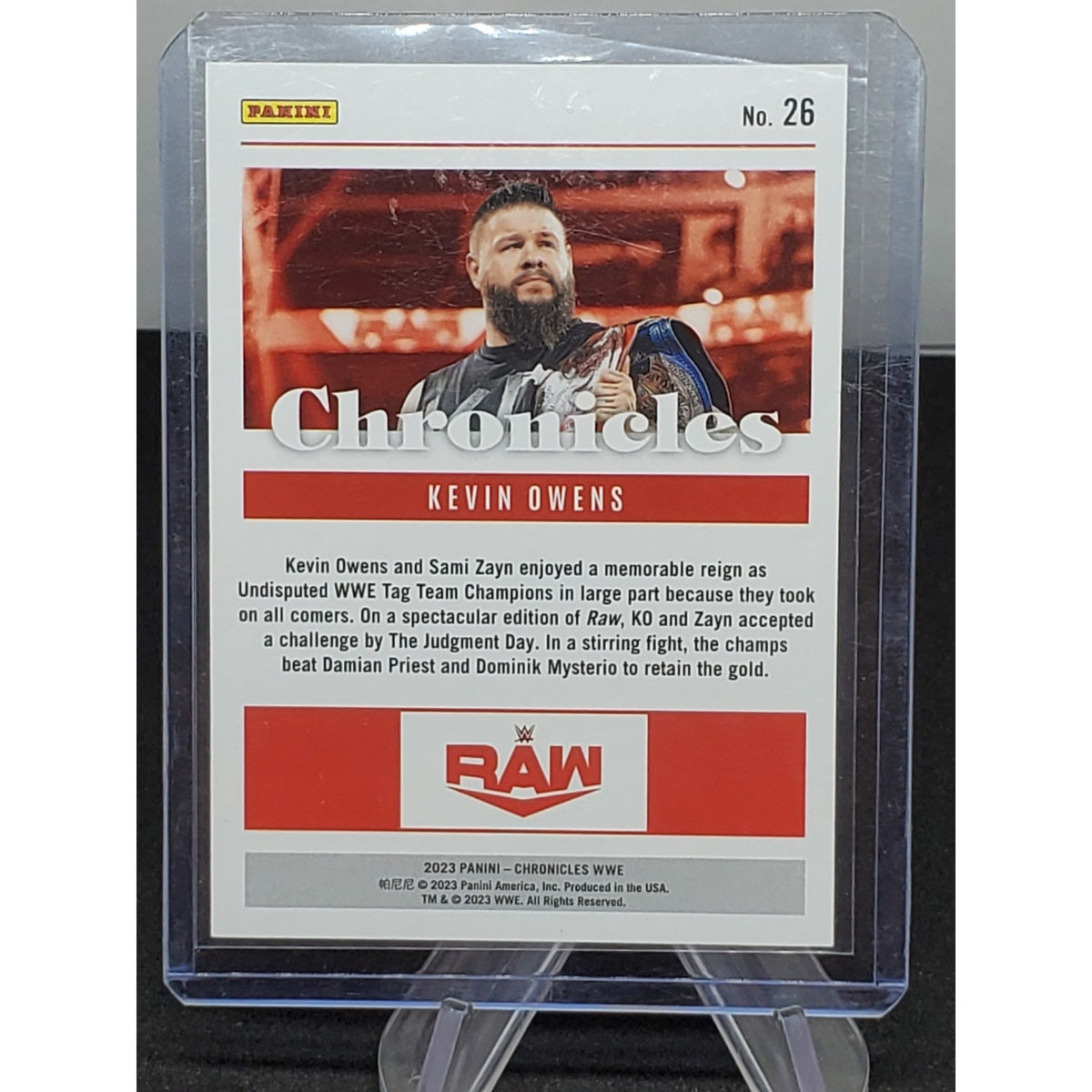 Kevin Owens 2023 Panini WWE Chronicles red /99