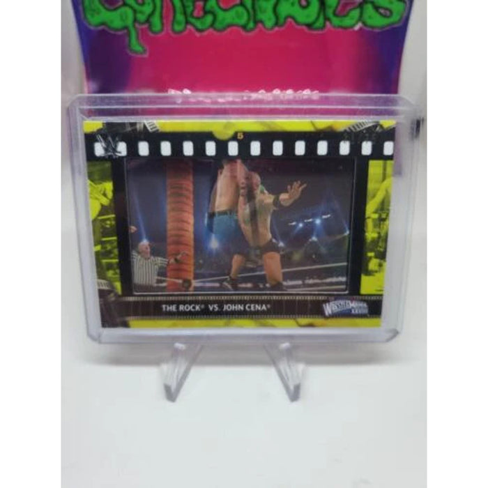 2021 Topps WWE The Rock vs John Cena Film Strip Relic Yellow 21/75 mint