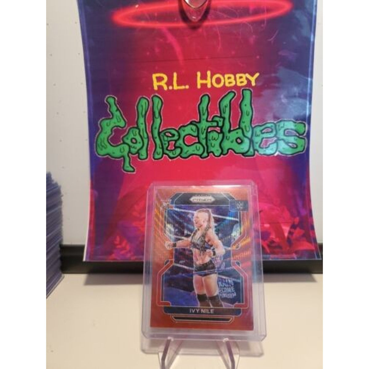 Ivy Nile 2022 Panini Prizm WWE #184 Rookie Ruby Red Wave Prizm