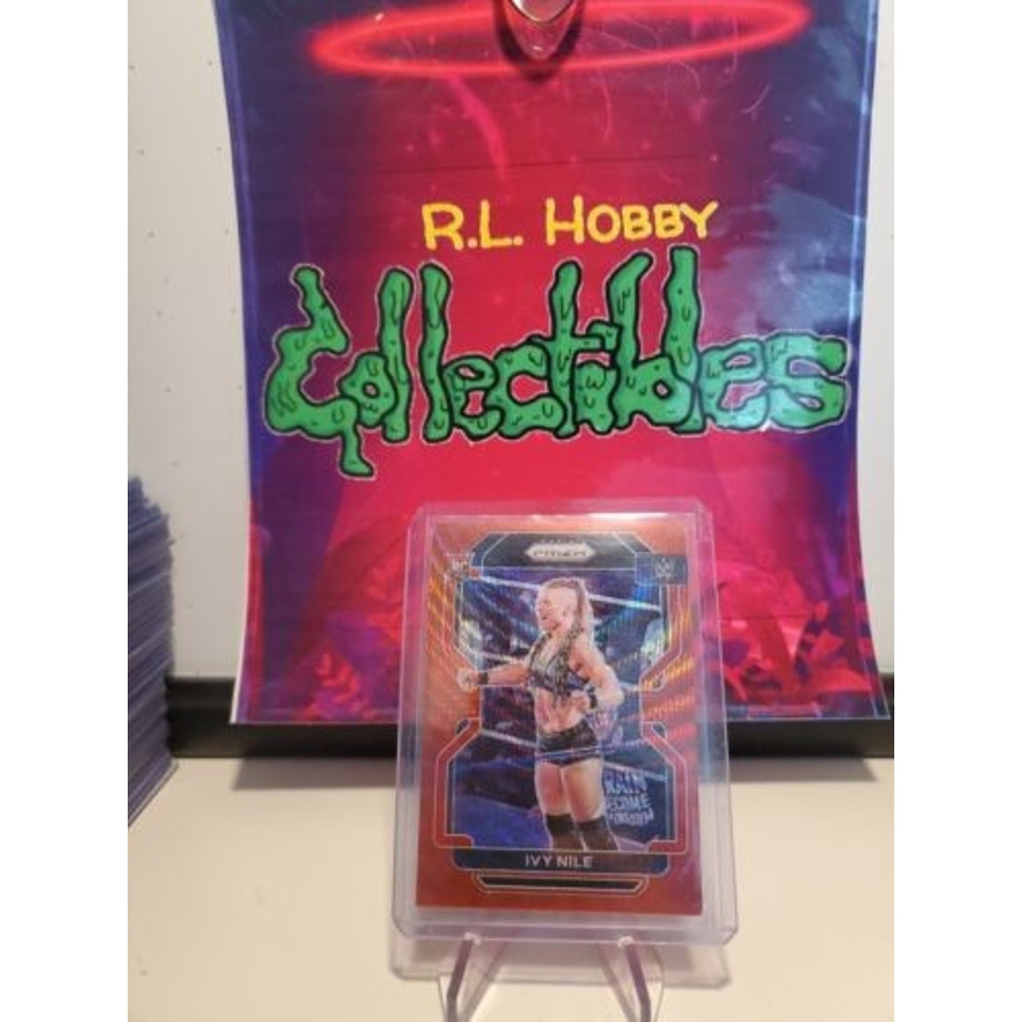 Ivy Nile 2022 Panini Prizm WWE #184 Rookie Ruby Red Wave Prizm