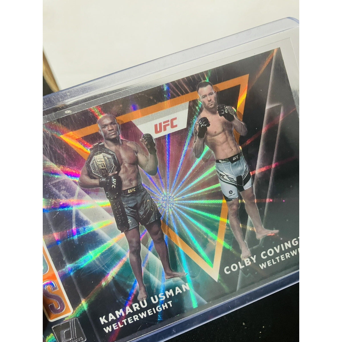 2022 Panini Donruss UFC Duos #4 Kamaru Usman Colby Covington Orange Laser Holo