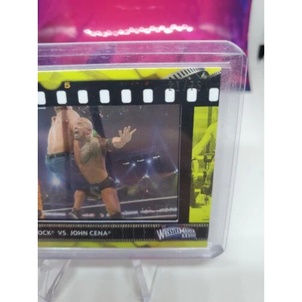 2021 Topps WWE The Rock vs John Cena Film Strip Relic Yellow 21/75 mint