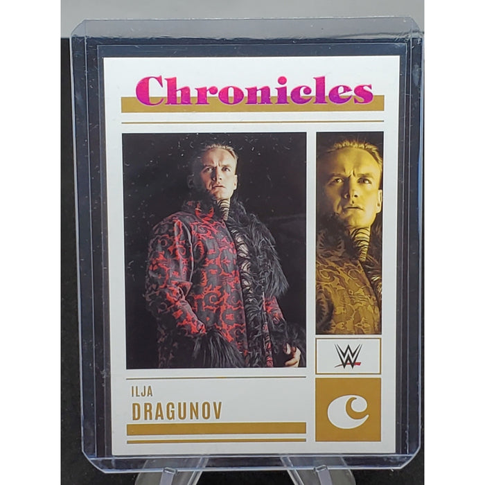 2023 Panini Chronicles WWE Ilja Dragunov Pink #/349