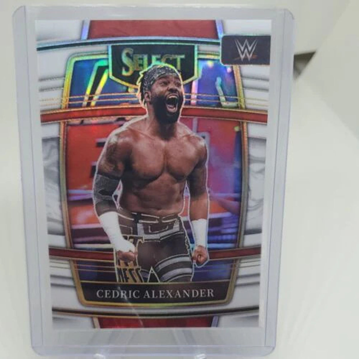 WHITE PRIZM /99 2022 Panini WWE Select Concourse #25 Cedric Alexander