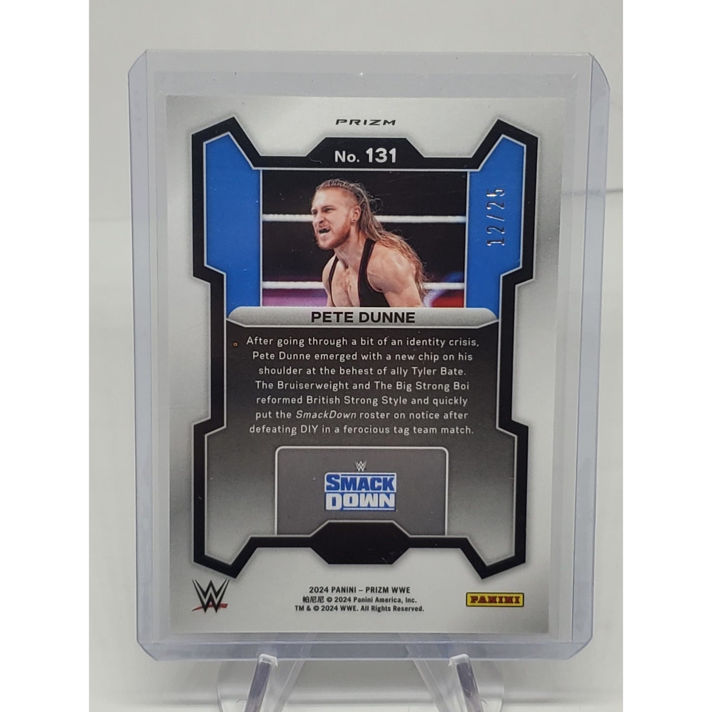 2024 Panini Prizm WWE #131 Pete Dunne Mojo Prizm #12/25