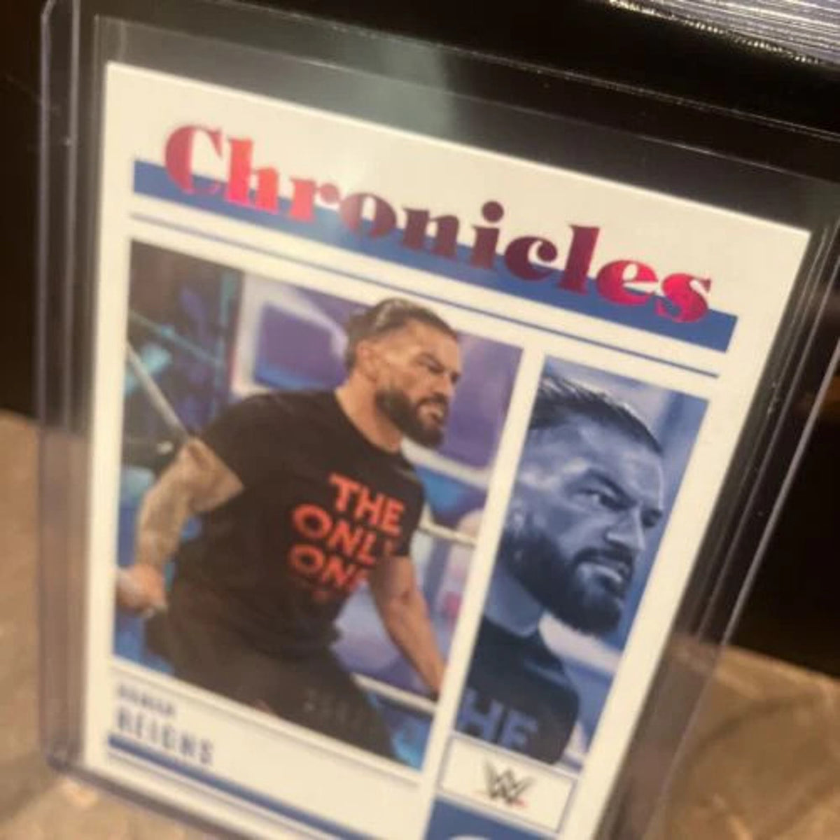 2023 Panini Chronicles WWE - Roman Reigns #44 - Pink /349 SP - Pack Fresh New