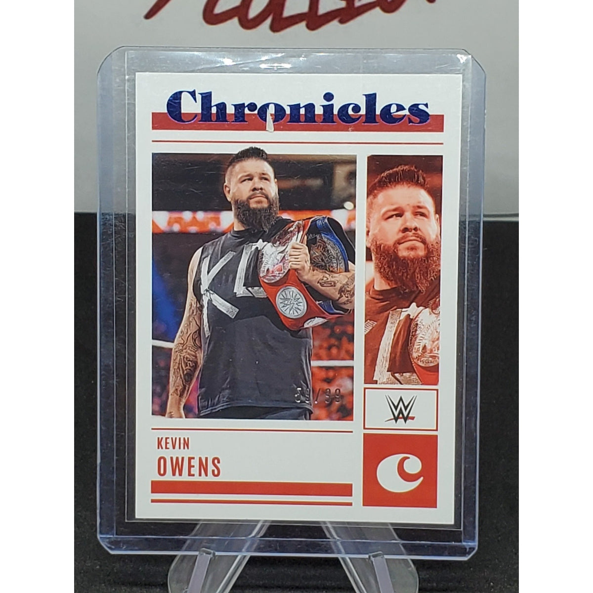 Kevin Owens 2023 Panini WWE Chronicles red /99