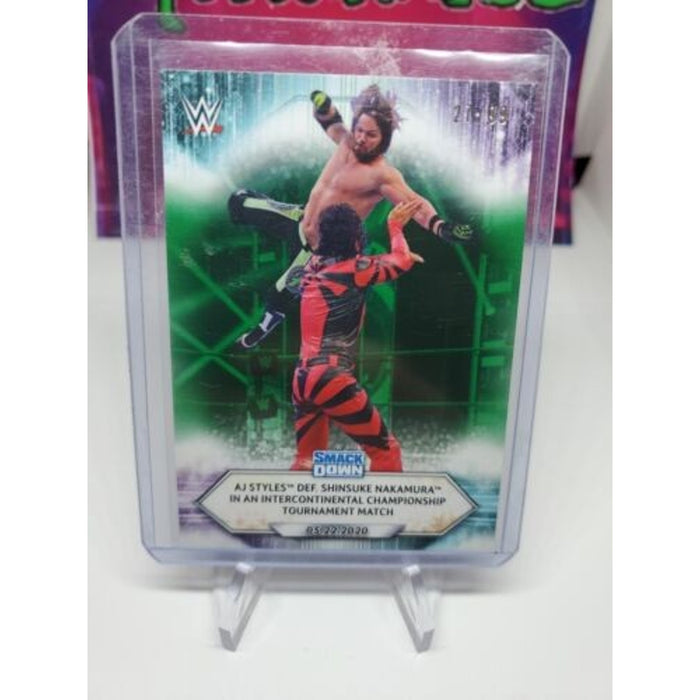2021 Topps WWE AJ Styles Defeats Shinsuke Nakamura #76 #/99