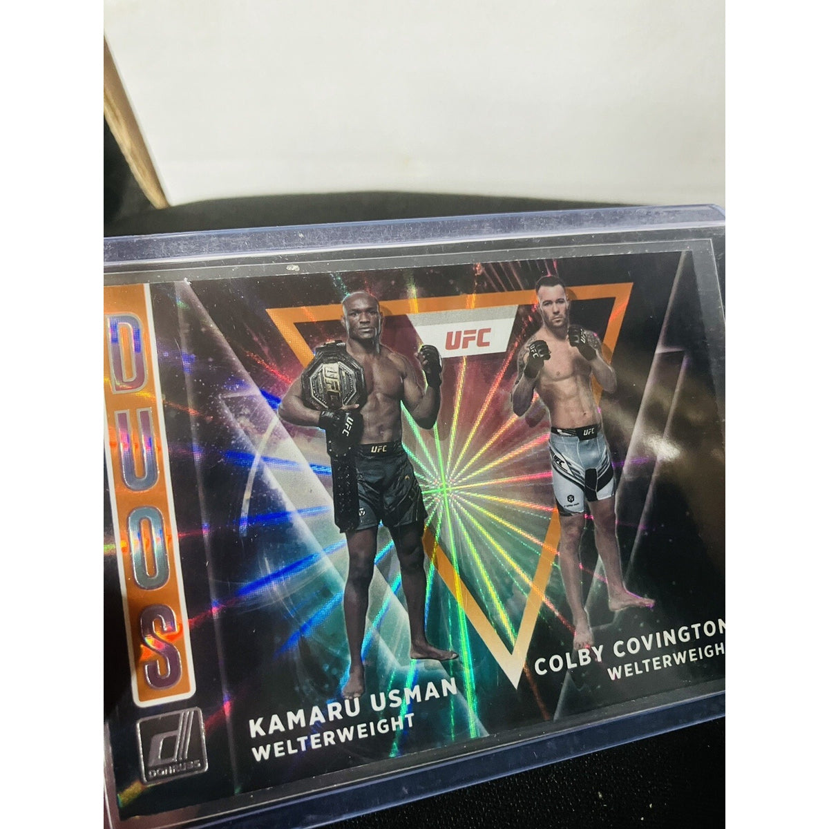 2022 Panini Donruss UFC Duos #4 Kamaru Usman Colby Covington Orange Laser Holo