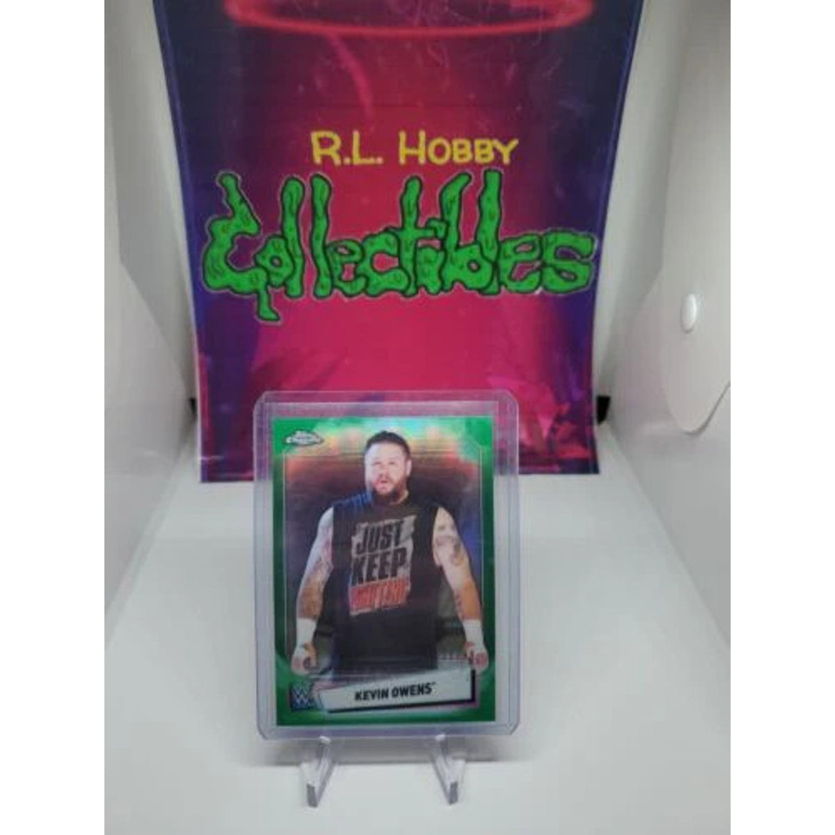 2021 Topps Chrome WWE Kevin Owens Green Refractor #/99