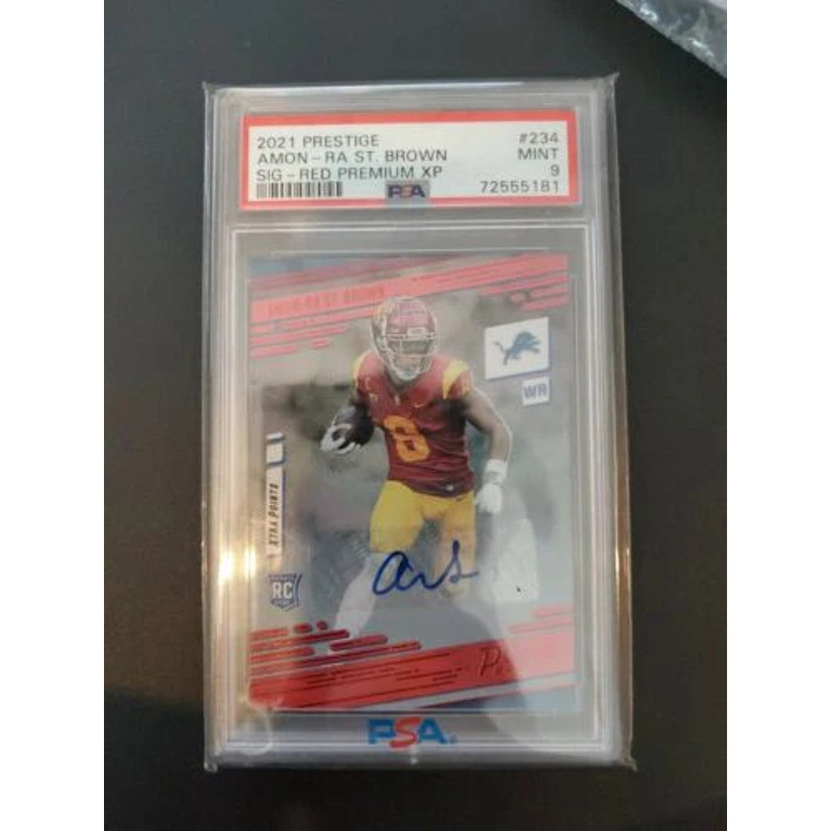 Amon-Ra St. Brown 2021 Prestige Red Xtra Points Rookie Auto #234 Lions RC PSA 9