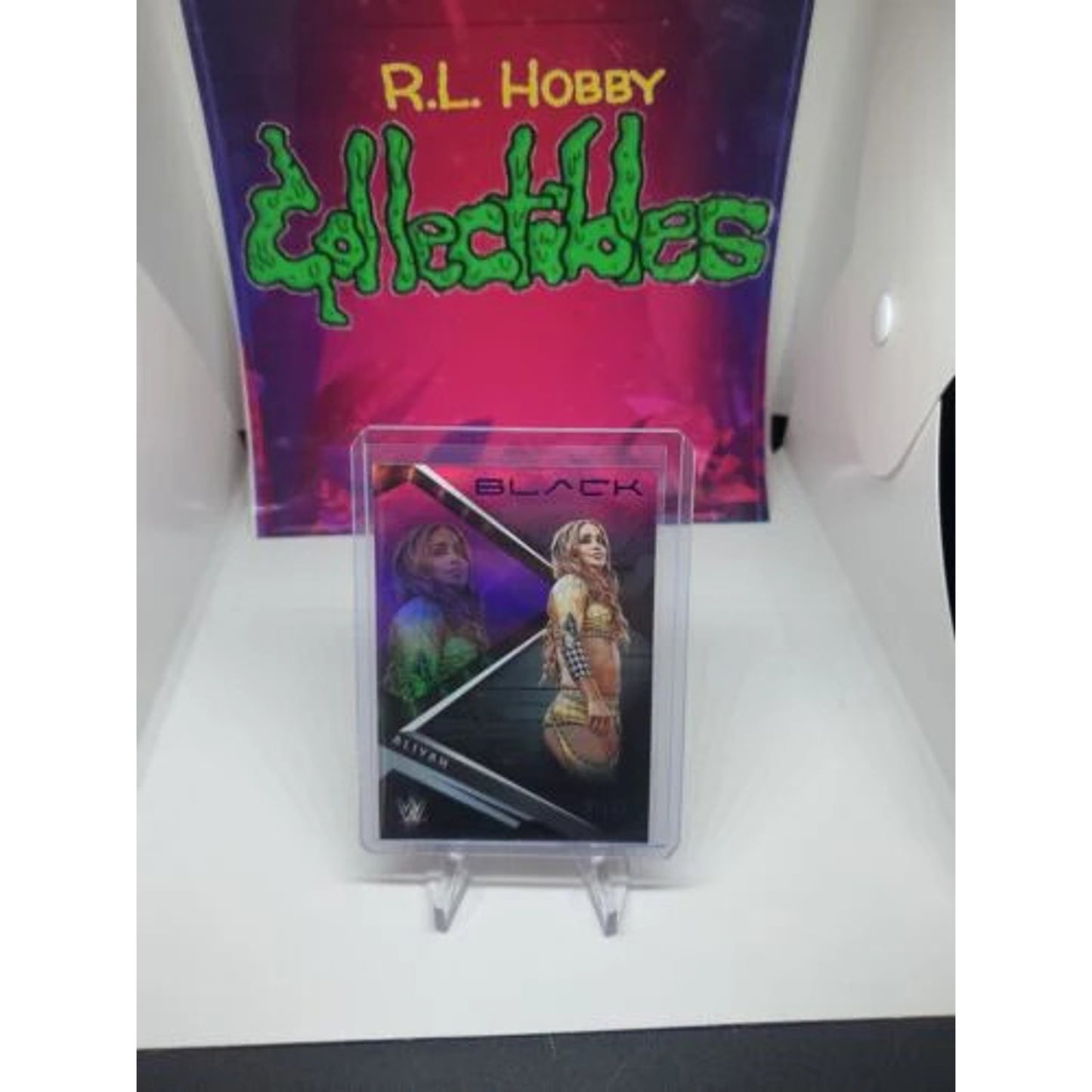 2022 Panini Chronicles Phoenix WWE ALIYAH Purple Parallel /49