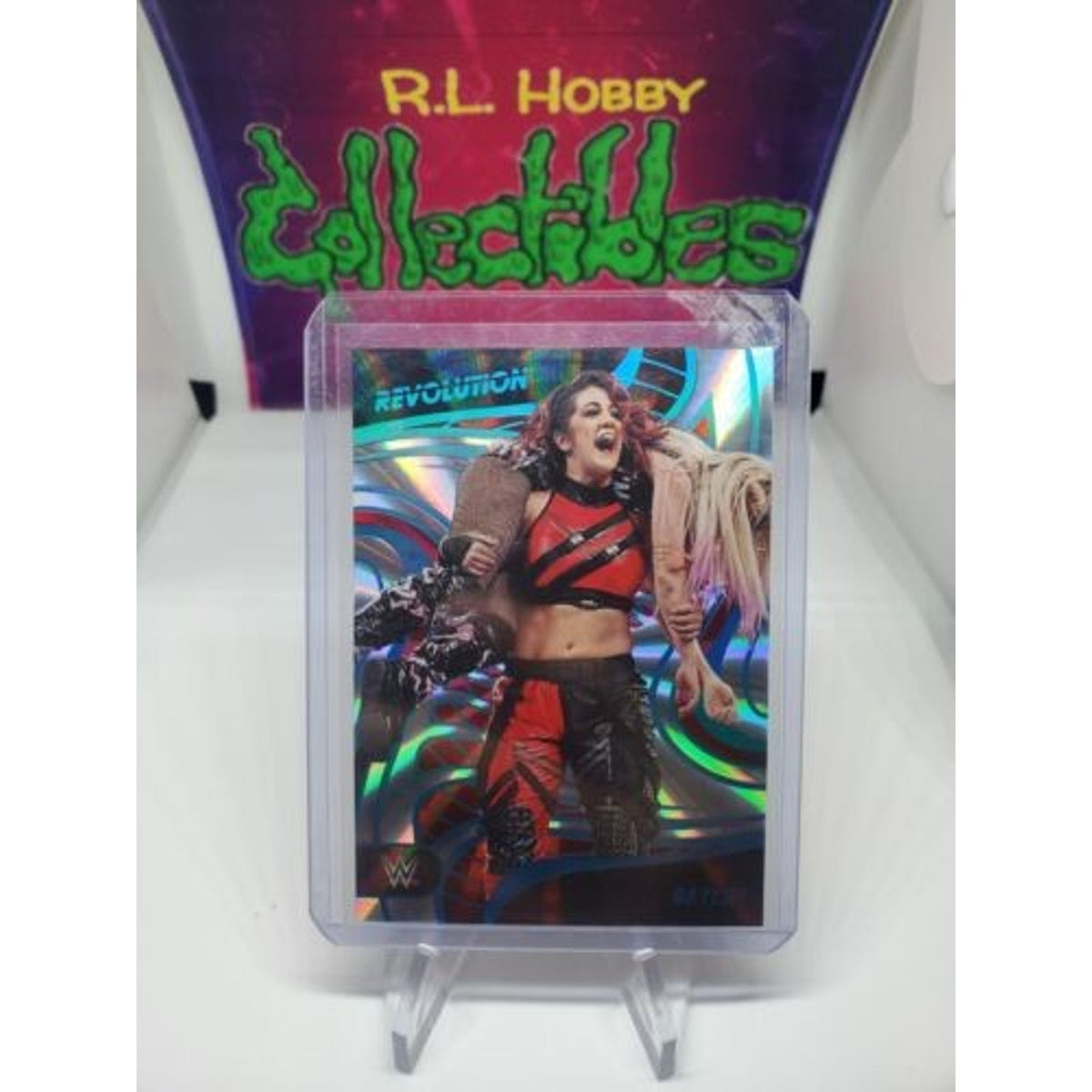 2023 Panini Revolution WWE Sunburst Bayley /99 Fresh Pull