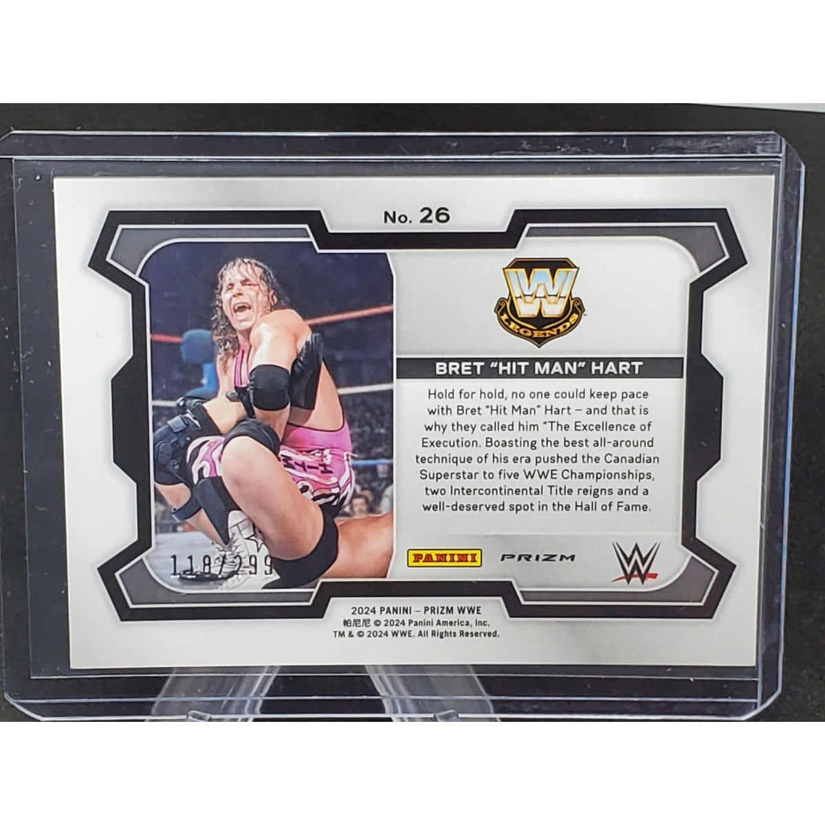 Bret "Hit Man" Hart 2024 Panini Prizm WWE Red Prizm #26 WWE Legends #/299