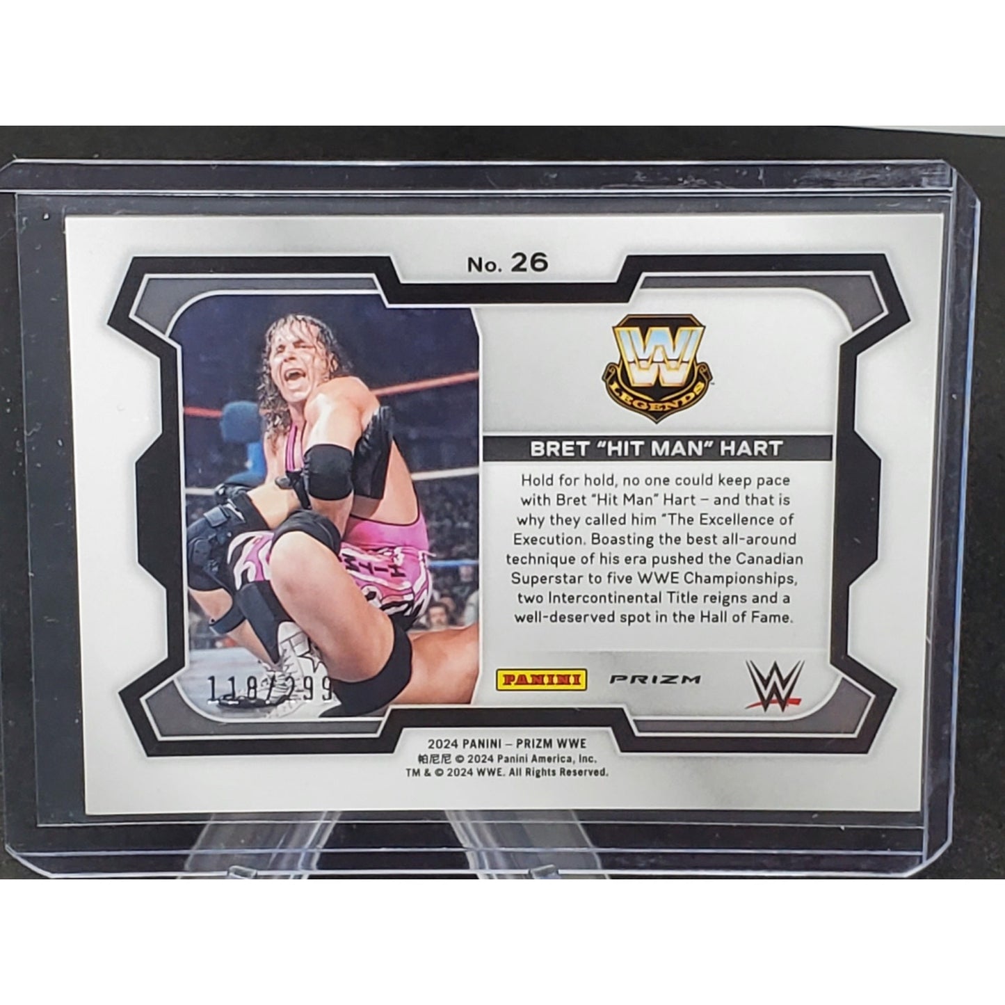 Bret "Hit Man" Hart 2024 Panini Prizm WWE Red Prizm #26 WWE Legends #/299