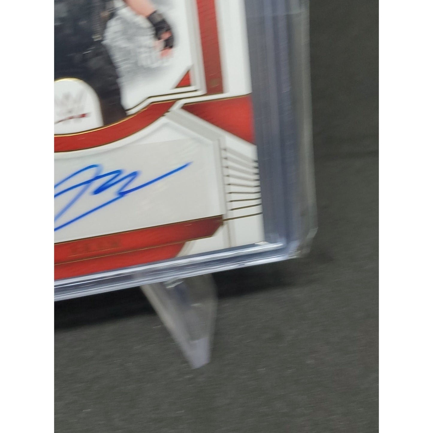 2024 Panini National Treasures WWE - Peerless Signatures Akam #PL-AKM /99 (AU)