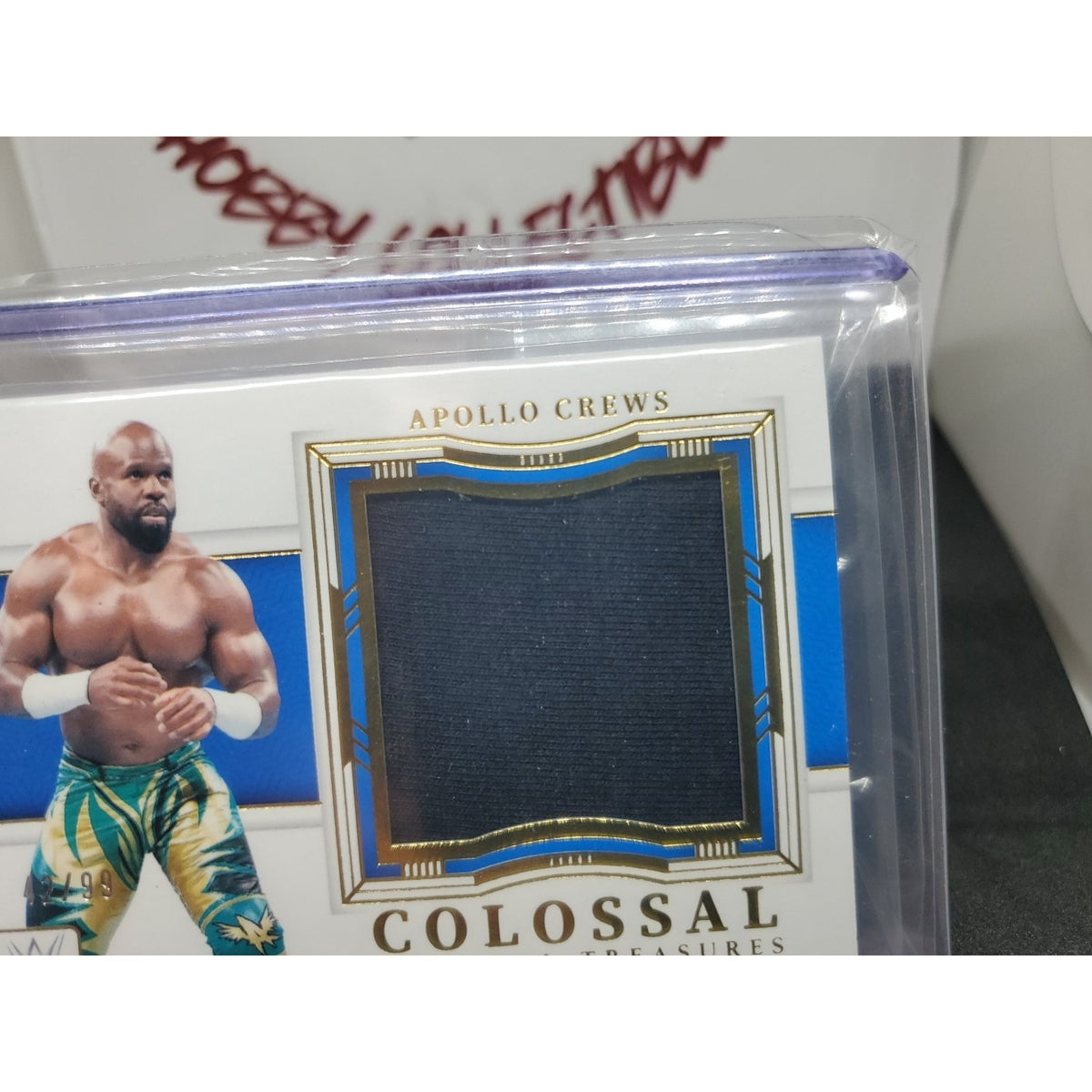 2024 Panini National Treasures WWE - Colossal Materials Apollo Crews #CL-ACR /99