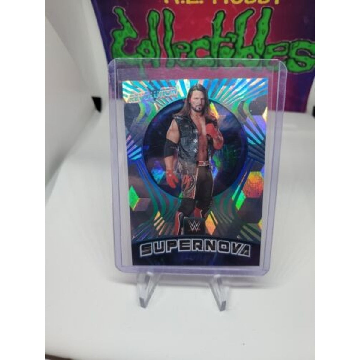 AJ STYLES 2022 PANINI WWE REVOLUTION SUPERNOVA CUBIC #'d /49 Debut Edition
