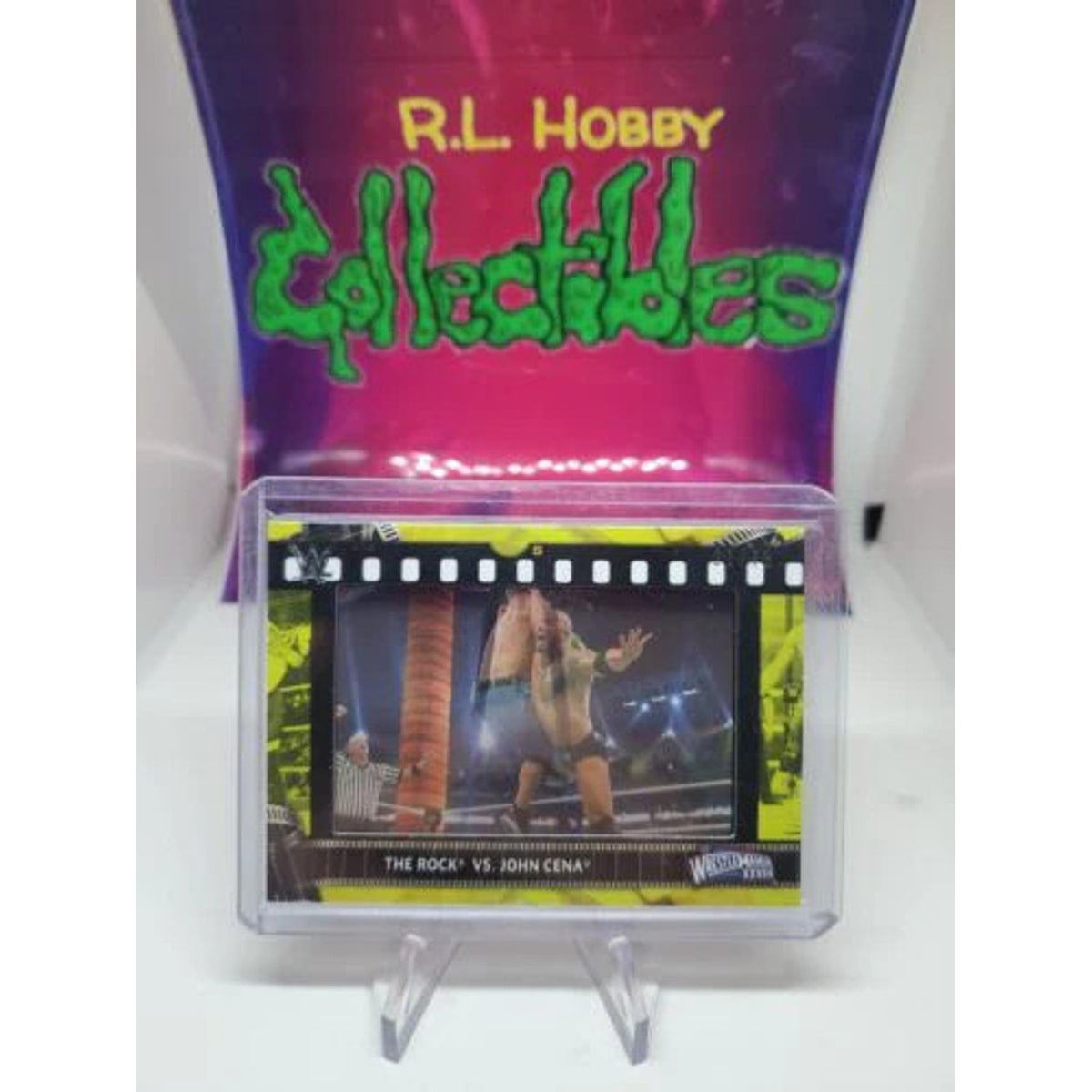 2021 Topps WWE The Rock vs John Cena Film Strip Relic Yellow 21/75 mint