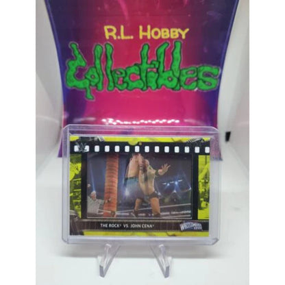 2021 Topps WWE The Rock vs John Cena Film Strip Relic Yellow 21/75 mint